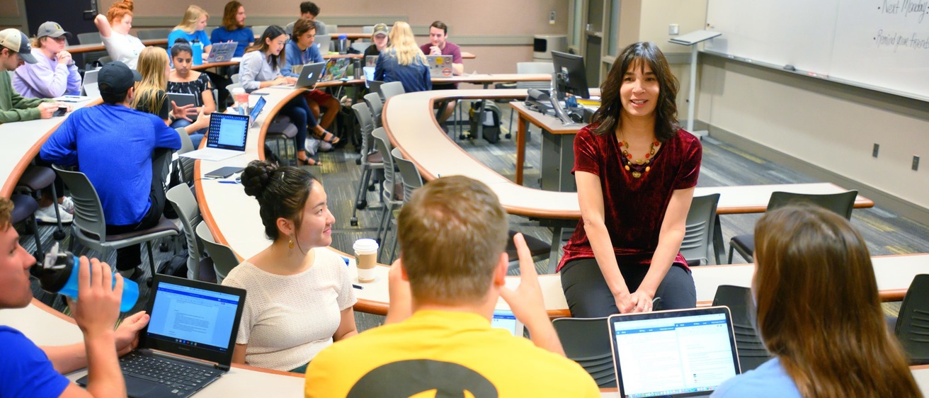 Instructor interacting with her students