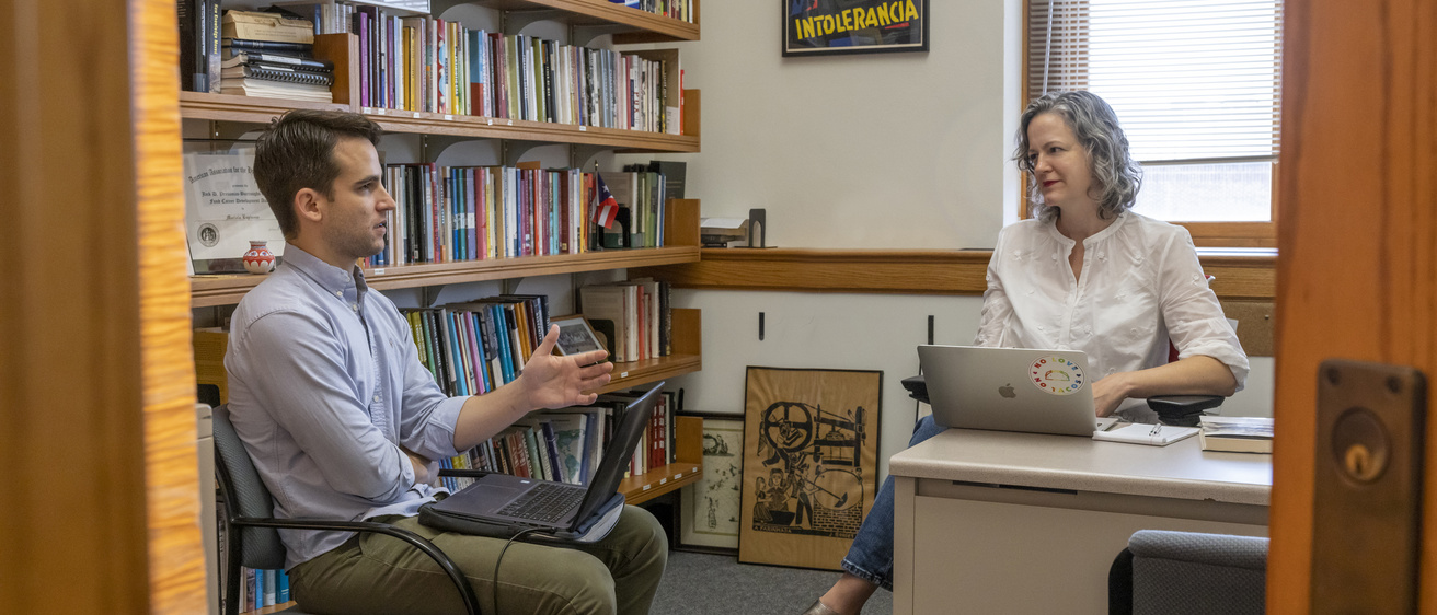 Independent Study student meeting with a history instructor