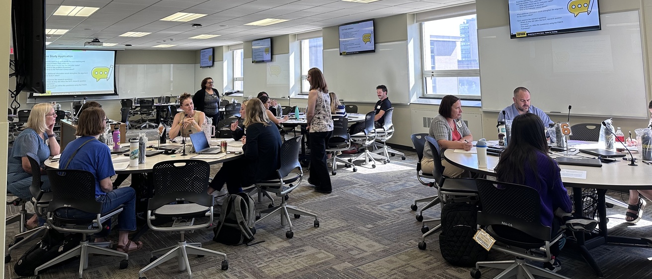 SoTL Scholars at an event discussing scholarly teaching