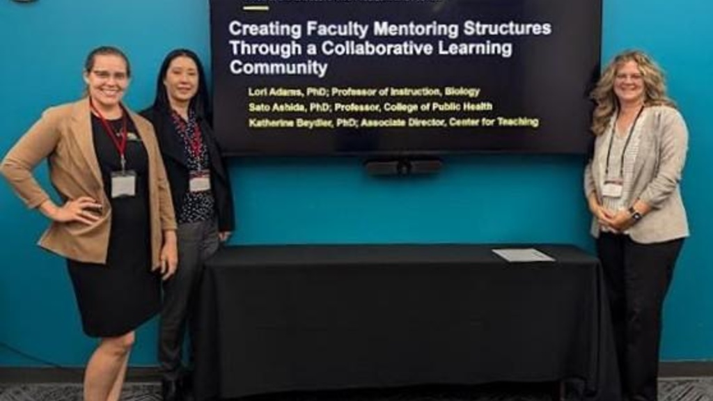 three women presenting "Creating Faculty Mentoring Structures through a Collaborative Learning Community"